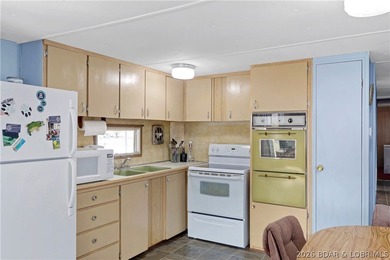Here is a vacation home steps from the water with a nice view of - photo 29