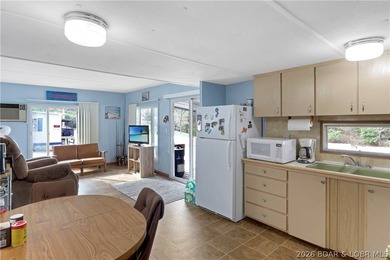 Here is a vacation home steps from the water with a nice view of - photo 30