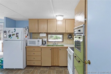 Here is a vacation home steps from the water with a nice view of - photo 31
