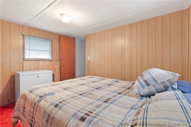 Here is a vacation home steps from the water with a nice view of - photo 36