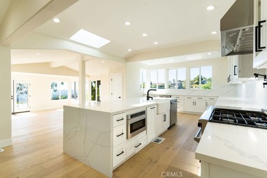 This newly renovated home with breathtaking 180-degree ocean - photo 13