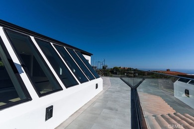 This newly renovated home with breathtaking 180-degree ocean - photo 33