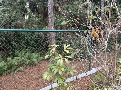 Enjoy the privacy of the preserve with this updated back in lot - photo 10