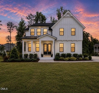 7633 Hasentree Way offers refined luxury living in Hasentree - photo 1