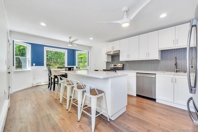 This sprawling and expanded Cape is set on an exceptional .75 - photo 21