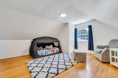 This sprawling and expanded Cape is set on an exceptional .75 - photo 35