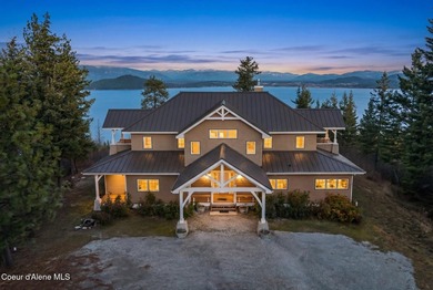 Perched above Lake Pend Oreille on 95+ acres, this extraordinary - photo 1