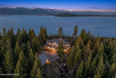 Perched above Lake Pend Oreille on 95+ acres, this extraordinary - photo 3