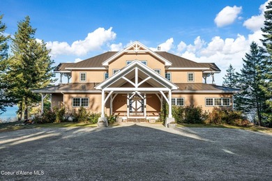 Perched above Lake Pend Oreille on 95+ acres, this extraordinary - photo 9