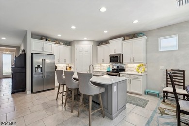 Welcome to this exceptional 4-bedroom, 2-bath pool home in the - photo 12