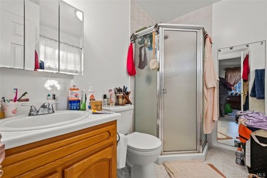 This well-designed two-unit property offers a flexible layout - photo 13