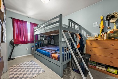 This well-designed two-unit property offers a flexible layout - photo 18