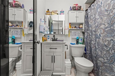 This well-designed two-unit property offers a flexible layout - photo 19