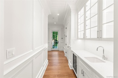 Nestled in the picturesque community of Westhampton Beach, this - photo 22