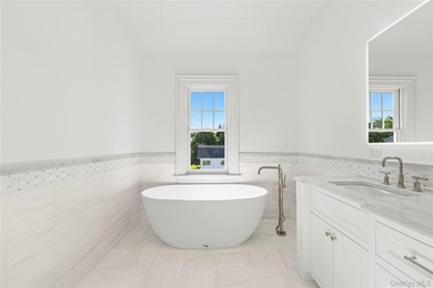 Nestled in the picturesque community of Westhampton Beach, this - photo 32