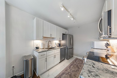 Welcome to effortless city living in Loring Park. This - photo 7