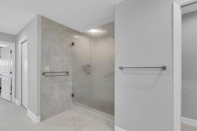 EXCEPTIONAL CORNER UNIT 3BR, 2BA CONDO WITH STUNNING WATER