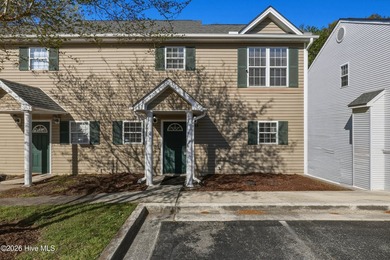 Presented is a rare opportunity to own a townhome in the highly - photo 3