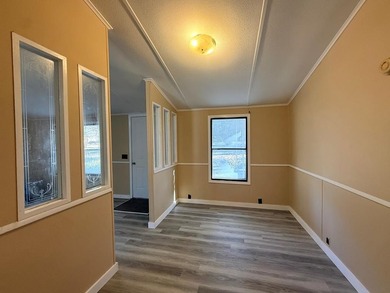 Completely renovated, this 3-bedroom, 2-bathroom home is just 2 - photo 4