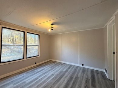 Completely renovated, this 3-bedroom, 2-bathroom home is just 2 - photo 5