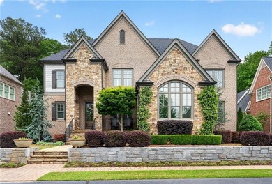 Nestled within the prestigious River District, a coveted gated - photo 1