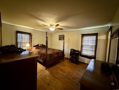 Lovely brick ranch-style home with just over 12 acres! Through - photo 14