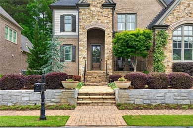 Nestled within the prestigious River District, a coveted gated - photo 4