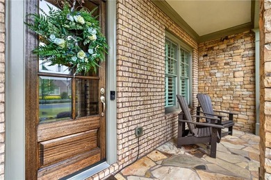 Nestled within the prestigious River District, a coveted gated - photo 7