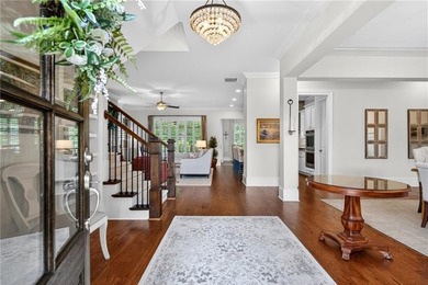 Nestled within the prestigious River District, a coveted gated - photo 8
