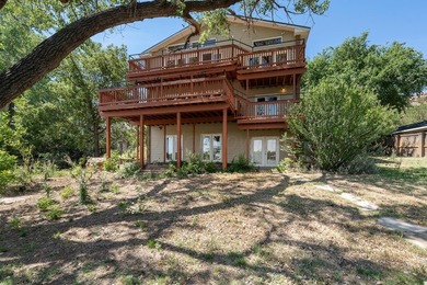 Priced below PRAD, this waterfront Lake Tanglewood home offers - photo 1