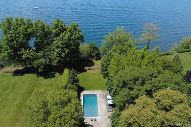 Welcome to 7 Cedar Lane, a remarkable turnkey residence perched - photo 1