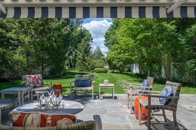Welcome to 7 Cedar Lane, a remarkable turnkey residence perched - photo 2