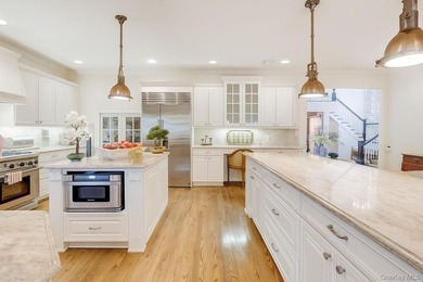 Welcome to 7 Cedar Lane, a remarkable turnkey residence perched - photo 6