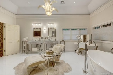 Welcome to 7 Cedar Lane, a remarkable turnkey residence perched - photo 8
