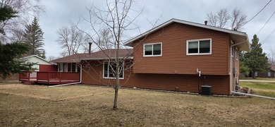 This charming 3-bed, 3-bath home sits on a beautiful lot in a - photo 2