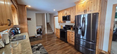 This charming 3-bed, 3-bath home sits on a beautiful lot in a - photo 7