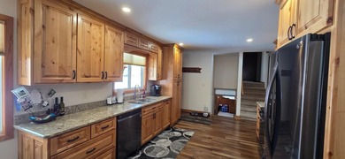 This charming 3-bed, 3-bath home sits on a beautiful lot in a - photo 8