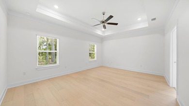 Situated on nearly three-quarters of an acre, this exceptional - photo 11