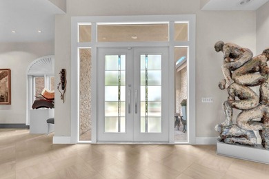 NEARLY ONE ACRE LOT! Breathtaking lakefront beauty is showcased - photo 27