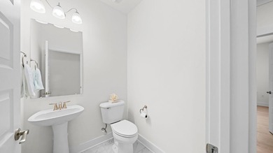Situated on nearly three-quarters of an acre, this exceptional - photo 29