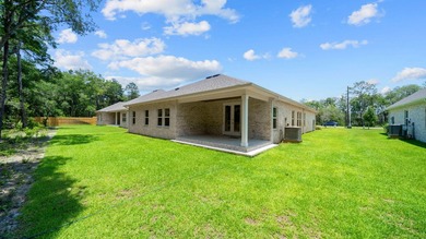Situated on nearly three-quarters of an acre, this exceptional - photo 32