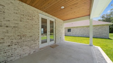 Situated on nearly three-quarters of an acre, this exceptional - photo 33