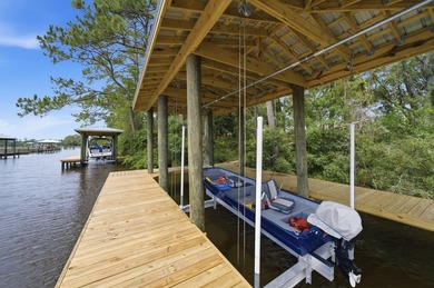 Situated on nearly three-quarters of an acre, this exceptional - photo 36