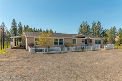This spacious 4-bedroom, 2-bathroom home sits on an impressive - photo 6
