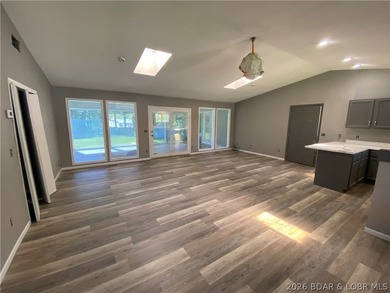 This home checks a lot of boxes: Location, blacktop to your door - photo 11