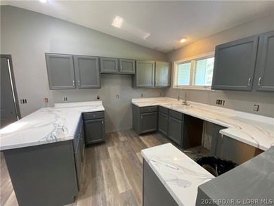 This home checks a lot of boxes: Location, blacktop to your door - photo 13