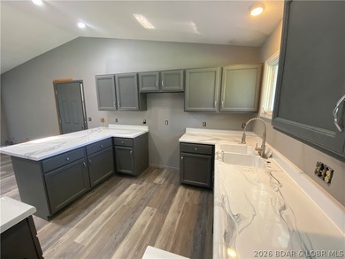 This home checks a lot of boxes: Location, blacktop to your door - photo 14