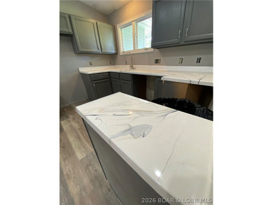 This home checks a lot of boxes: Location, blacktop to your door - photo 16