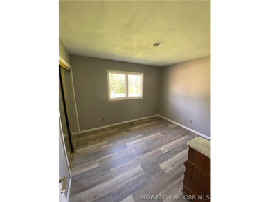 This home checks a lot of boxes: Location, blacktop to your door - photo 25
