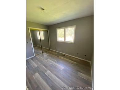 This home checks a lot of boxes: Location, blacktop to your door - photo 26